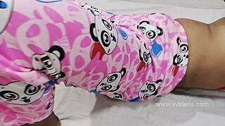 Young college girl receives relaxing massage in private room