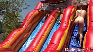 Lesbians going wild with strapon in outdoor group fun