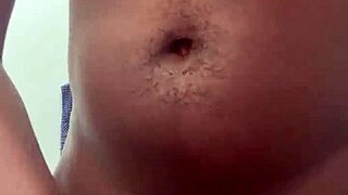 I stroke my huge nut in the bathroom close-up.