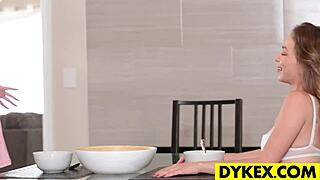 a cougar licks young pussy with a strapon and dildo