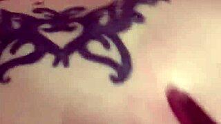 Big tatted up babe gets her big titty oiled up and gets her ass tapped behind
