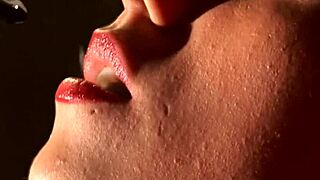 Stripping down to her corset to rub her pussy for her audience