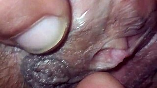 Wet pussy teases with provocative contrasts in action
