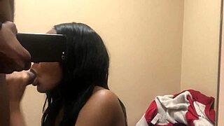 Watch me suck his big black cock in the changing room