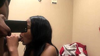 Watch me suck his big black cock in the changing room