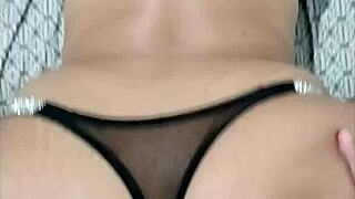 Latina masturbates in lingerie.