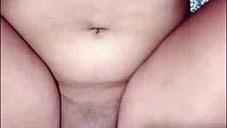 Latina masturbates in lingerie.