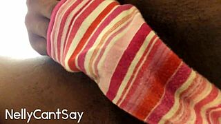 Black babe masturbates to orgasm in her thong panties.