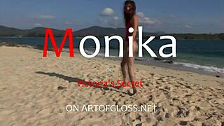 monika wears shiny pantyhose on the beach