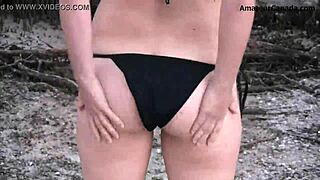 flashing striptease teen 18+ blonde in bikini by the beach in public