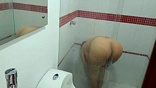 I spyed on my stepmom in the shower, she has big tits and was sucking a big cock.