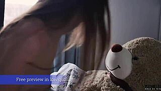 Y student cuddles teddy bear during morning routine