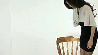 Asian lesbian explores bondage with white women