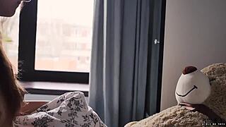 Y student cuddles teddy bear during morning routine