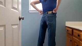 Wetting tight denim jeans in bathroom