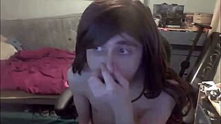 shemale teen 18+ dildoing her mouth and stroking her cock