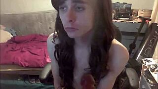 shemale teen 18+ dildoing her mouth and stroking her cock