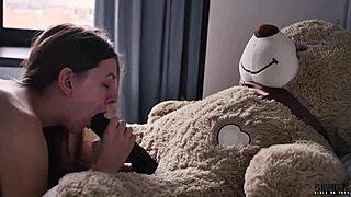 Y student cuddles teddy bear during morning routine