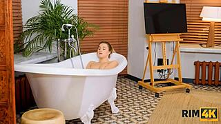 Watch this beautiful blonde bend over and lick her bf's asshole in the bath?