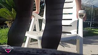 Nippleringlover fucks dildo outdoors with pierced nipples