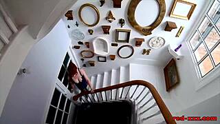 insatiable red xxx milf masturbates on stairs