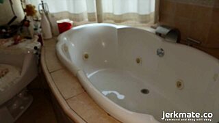 beautiful blonde babe masturbates in bath with fingering