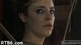 alluring models undress inside a petite cage