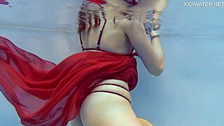 Marfa, the cute russian pornstar, strips naked in the pool for an underwater adventure.