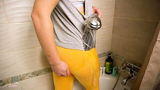 asian amateur soaking wet in shower with tight yoga pants.