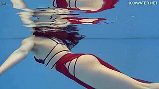 Russian beauty pops up with some secrets in the pool