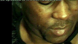 A dark-skinned woman with well-endowed natural boobs gets boned from behind