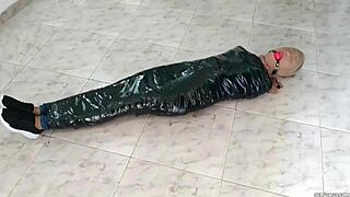 Duct tape mummified girl gets hooded in pantyhose. Sadistic women ball gag her tight! 😈