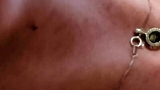 I can't stop watching this lollipop milf pleasure herself on the couch with a dildo