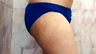 Store curing Asian fat chick with large tits masturbating in the shower