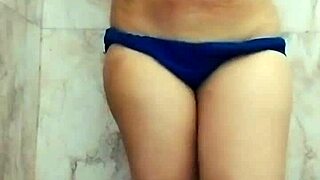 Store curing Asian fat chick with large tits masturbating in the shower