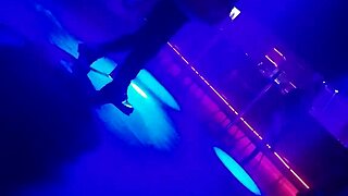 gogo dancer pulls married brunette to dance, lifting her dress.