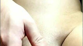 Young Japanese guy stroking his smooth cock solo