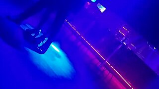 gogo dancer pulls married brunette to dance, lifting her dress.