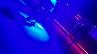 gogo dancer pulls married brunette to dance, lifting her dress.