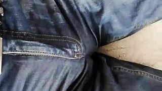 Woman Peeing In Jeans On Sofa