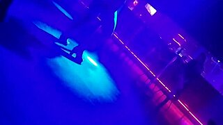 gogo dancer pulls married brunette to dance, lifting her dress.