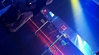 gogo dancer pulls married brunette to dance, lifting her dress.