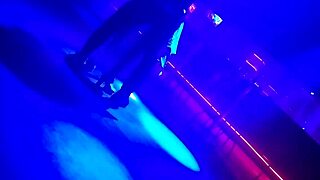 gogo dancer pulls married brunette to dance, lifting her dress.