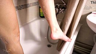 Muscular calf fetish wet shower by young amateur