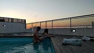 Cumming a lot in the pool at sunset