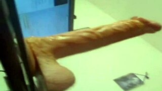 dude, this blonde deepthroats a huge dildo like crazy! 😲