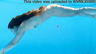 russian baddy ivi rein gets all steamy and horny underwater in a tight dress.
