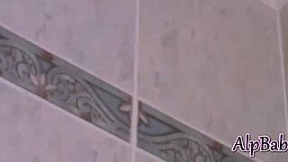 Blonde euro teen strips and teases in steamy bath