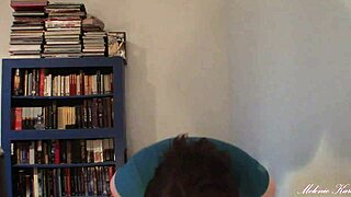 Melonie Kares plays with her natural assets in a tit drop