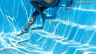 russian baddy ivi rein gets all steamy and horny underwater in a tight dress.